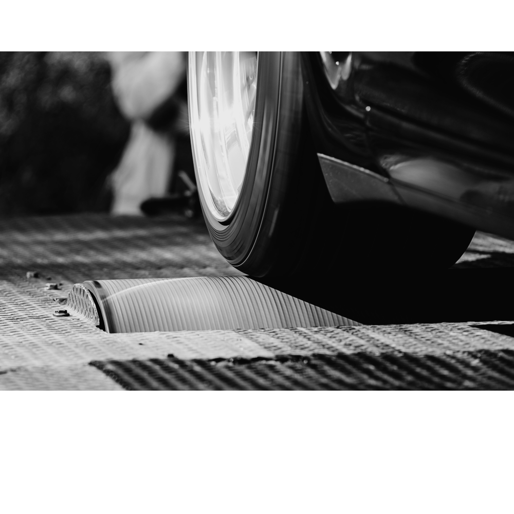 performance car wheel on dyno rollers during ECU tuning and dyno run at Mach 1 Motorsport Newcastle.